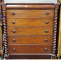 A Victorian mahogany chest of drawers with frieze drawer over five long drawers flanked by barley