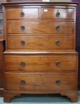A 20th century mahogany bow front chest on chest with two short over two long drawers on base with