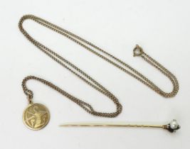 A German 8ct gold Sagittarius pendant and 64cm chain, together with a yellow metal eagle's claw