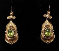 A pair of yellow metal peridot earrings, length 4.2cm, weight 8gms Condition Report:Available upon