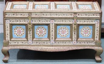 A 20th century Persian style dowry chest extensively decorated with painted panels and gilt brass