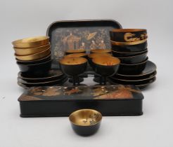 A Japanese gilded lacquer box, of rectangular form, decorated with scenes from everyday life, a