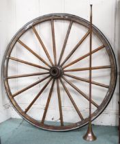 A lot comprising a 19th century carriage wheel, 116cm diameter and a copper horn (2) Condition