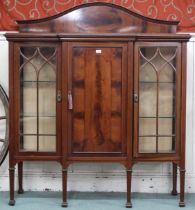 An Edwardian mahogany breakfront display cabinet with central cabinet door flanked by astragal
