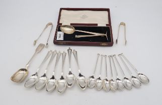 A collection of silver flatware including a pusher and feeder set by Cooper Brothers & Sons,