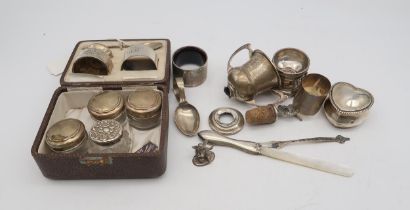 A collection of silver including a three piece christening set, by Samson & Mordan, Birmingham 1932,
