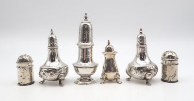 A collection of silver casters, including a late-Victorian example by Charles Stuart Harris,