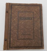 An early  German Schaubek stamp album together with note book of stamps and loose examples Condition