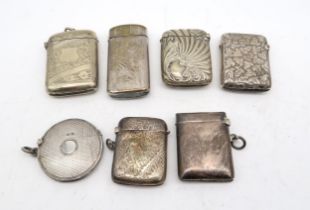A collection of silver and EPNS vestas, including three rectangular examples, Birmingham marks,