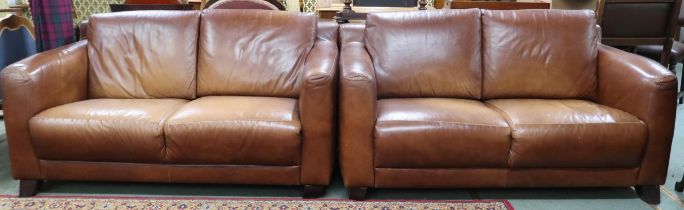 A pair of contemporary brown leather two seater settees, 75cm high x 153cm wide x 92cm deep