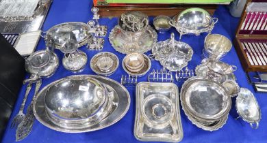 A large collection of EPNS including a breakfast rollover dish, tureens, teapots, cream jugs, wine