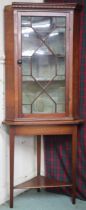 A late Victorian mahogany astragal glazed corner cabinet, 181cm high x 74cm wide  Condition Report: