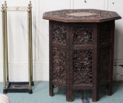 A lot comprising a 20th century Anglo-Indian hardwood octagonal table with foliate carved top on