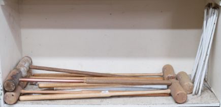 A lot of assorted croquet game pieces to include Jacques mallets, scoring hoops etc  Condition