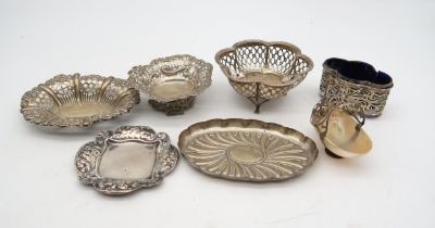 A collection of silver bon bon dishes, including a footed example by Mappin & Webb, Birmingham,