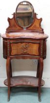 A contemporary Louis XVI style kidney shaped wash stand with oval mirror over two drawers on