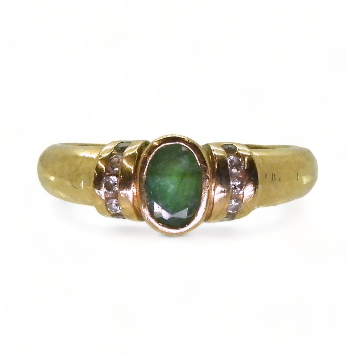 A 9ct gold emerald and diamond ring, size O1/2, weight 2.3gms  Condition Report:Available upon