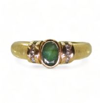 A 9ct gold emerald and diamond ring, size O1/2, weight 2.3gms  Condition Report:Available upon
