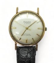 A 9ct gold gents Accurist 21 jewel watch head, weight without partial strap, 23.5gms  Condition