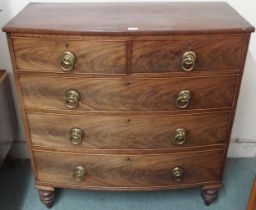 A Victorian mahogany two over three chest of drawers on turned supports, 107cm high x 105cm wide x