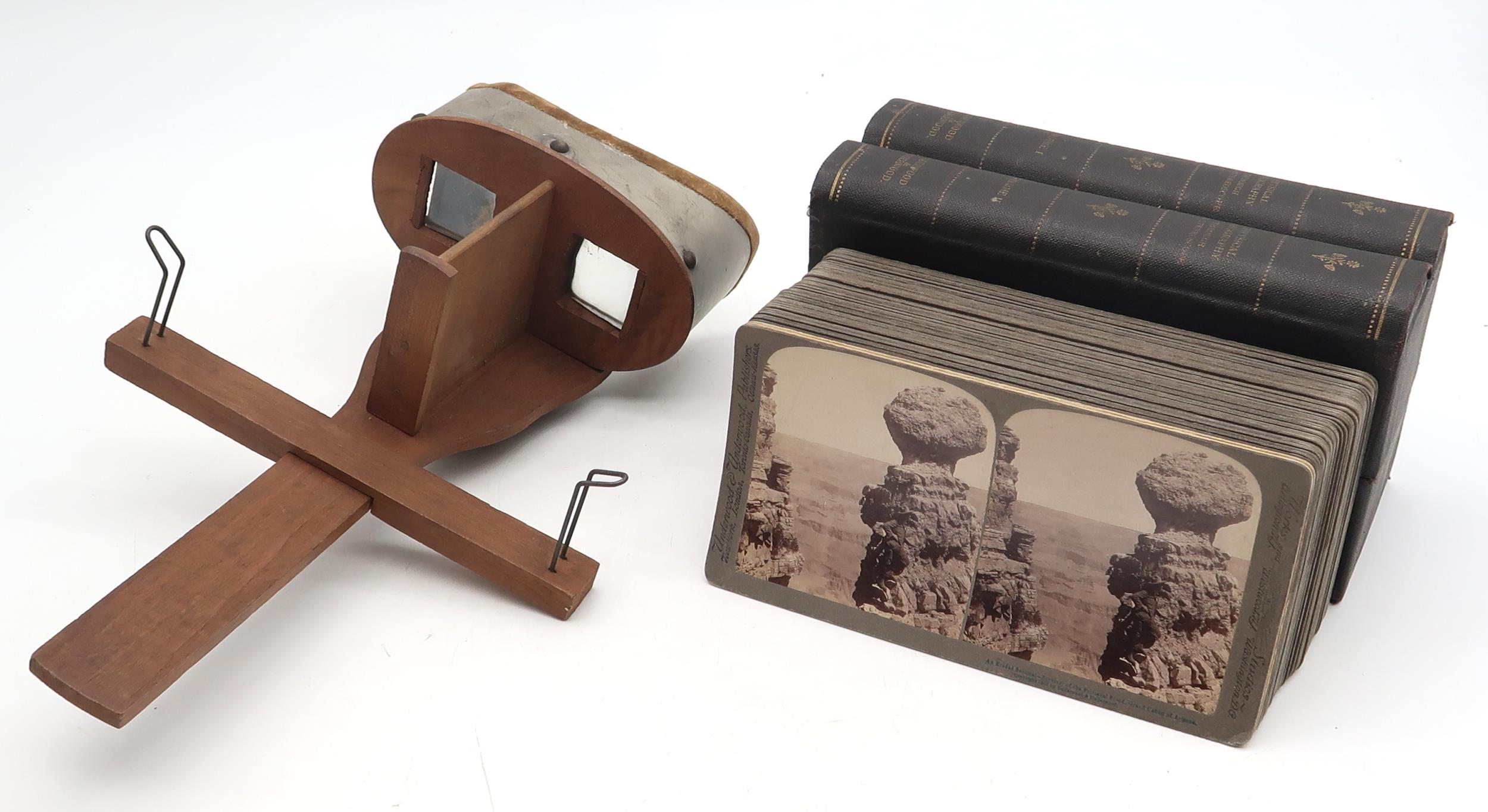 A stereoscopic slide viewer, with a cased set of views titled Physical Geography Through the - Image 2 of 3