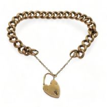 A 9ct gold curb link bracelet with heart shaped clasp, length 21cm, weight 15.5gms Condition