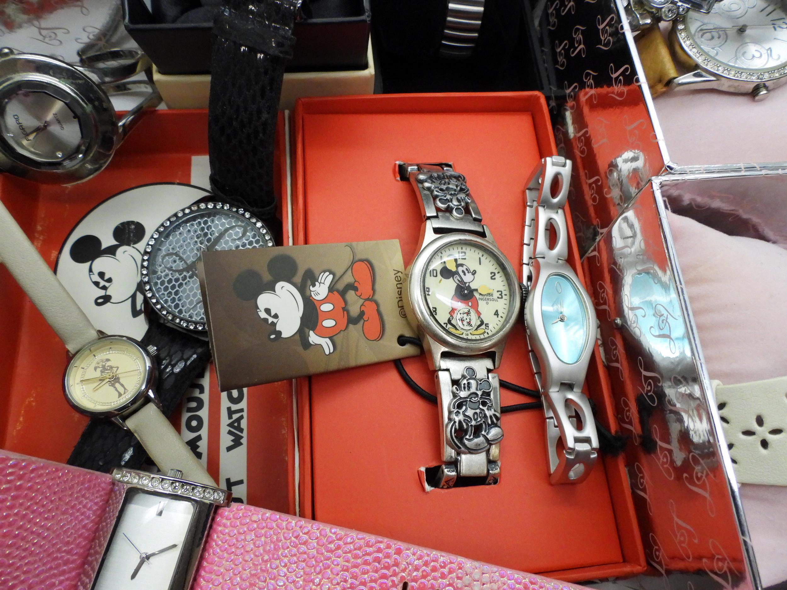 A large collection of ladies fashion watches, to include, a Danbury Mint Titanic Centenary silver - Image 4 of 4
