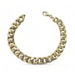 A 9ct gold curb link bracelet, length 21cm, weight 10.3gms Condition Report:Hollow construction, a