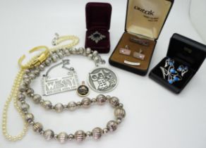 A Danish silver tie slide and cufflinks set by N.E.From, an Ortak silver brooch and earring set