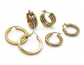 Three pairs of 9ct gold hoop earrings, two pairs are tricolour, weight together 18.1gms Condition