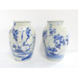 A pair of Chinese blue and white vases, one depicting a kingfisher Condition Report:Available upon