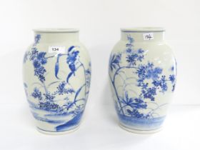 A pair of Chinese blue and white vases, one depicting a kingfisher Condition Report:Available upon