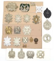 Assorted glengarry cap and cross belt badges, comprising a Victorian 92nd Gordon Highlanders screw-