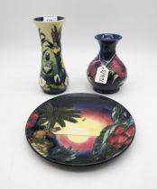A Moorcroft Lamia pattern vase, an Anemone pattern vase, together with a millennium Birth of Light