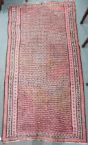 A pink ground Malayer runner with multicoloured borders, 260cm long x 134cm wide  Condition Report: