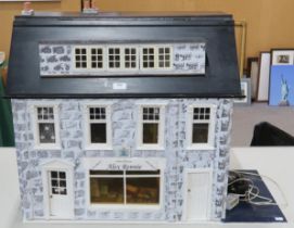 A large contemporary dolls' house, modelled as Alex Rennie's Poulterers, with contents, the