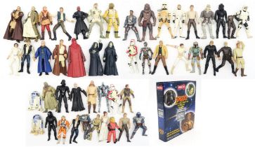 Star Wars: a collection of 1990s/2000s-era small scale action figures and a Tazo Collector's Force