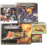 Boxed Warhammer 40,000 Space Marine Battle Force and Ork Scorcher sets, a Games Workshop Battlefleet