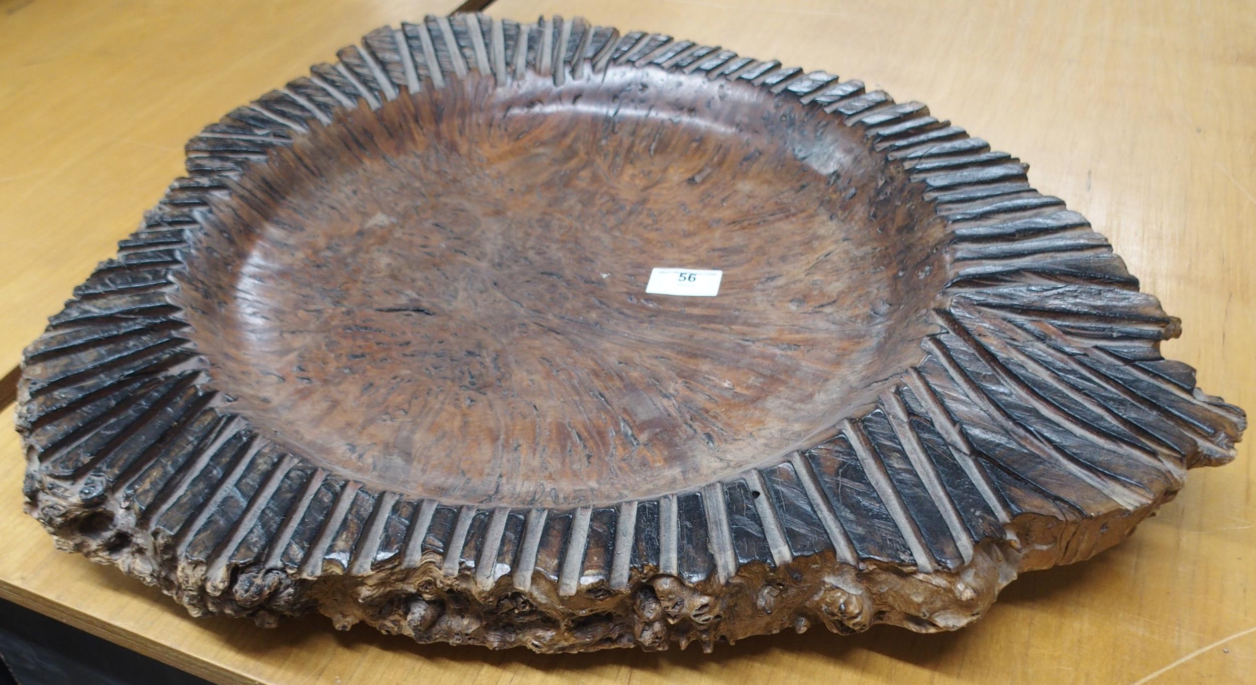 A late 20th century walnut live edge charger/bowl inscribed "Jahra 1999" to bottom, 58cm wide x 51cm
