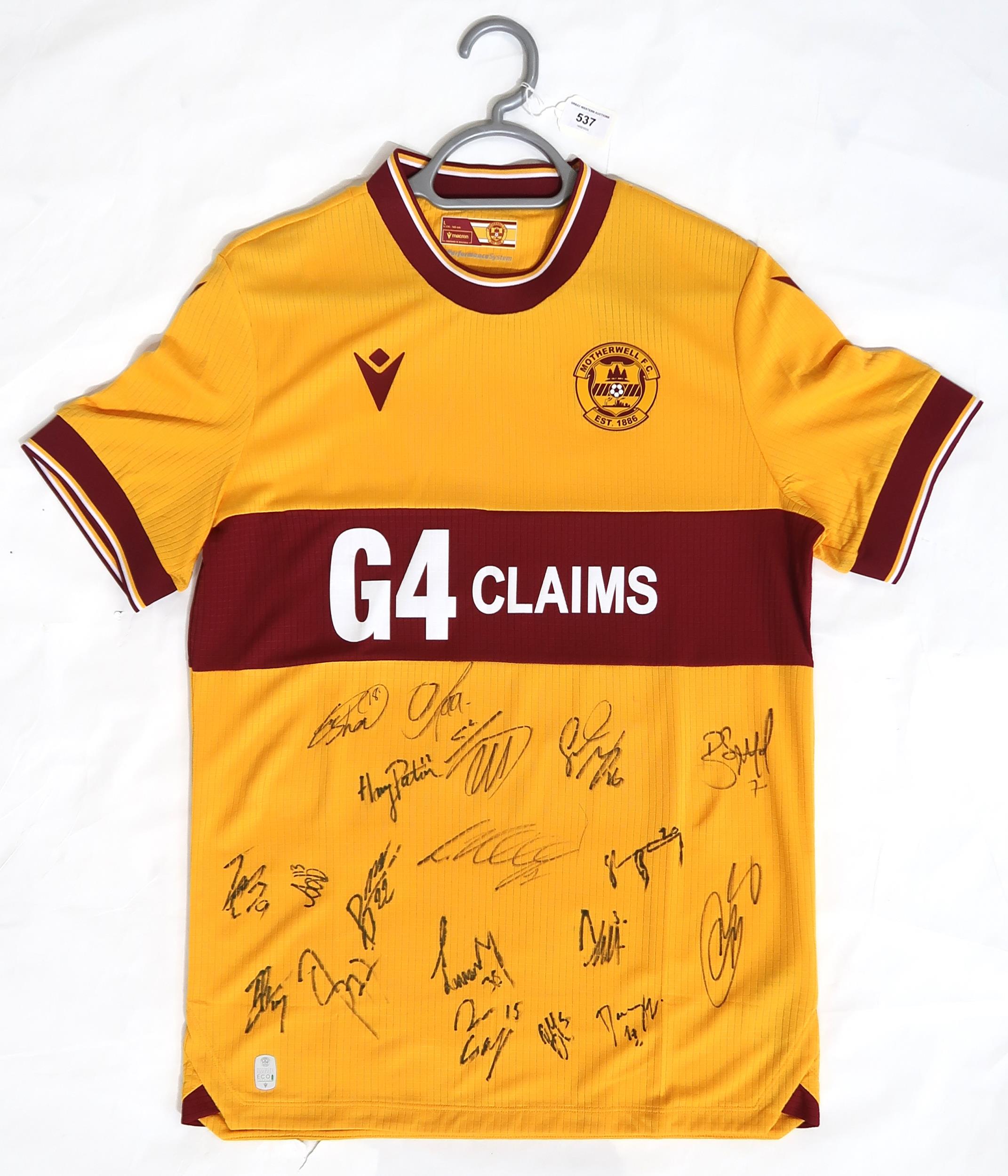 MOTHERWELL F.C. A 2023/24 Men's Home shirt, size L, bearing team signatures Proceeds to benefit Blue
