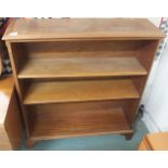 A 20th century teak open bookcase, 102cm high x 92cm wide x27cm deep Condition Report:Available upon