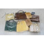 A collection of snakeskin and crocodile skin handbags etc Condition Report:Available upon request