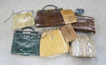 A collection of snakeskin and crocodile skin handbags etc Condition Report:Available upon request