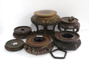 A collection of carved hardwood stands and  lacquer boxes Condition Report:Available upon request