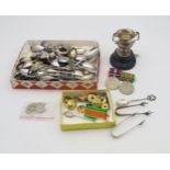 A silver trophy cup, Birmingham, a collection of mainly EPNS souvenir spoons, two pairs of silver