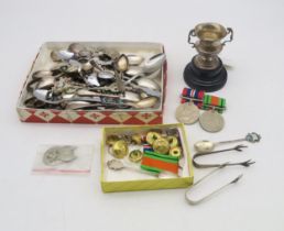 A silver trophy cup, Birmingham, a collection of mainly EPNS souvenir spoons, two pairs of silver