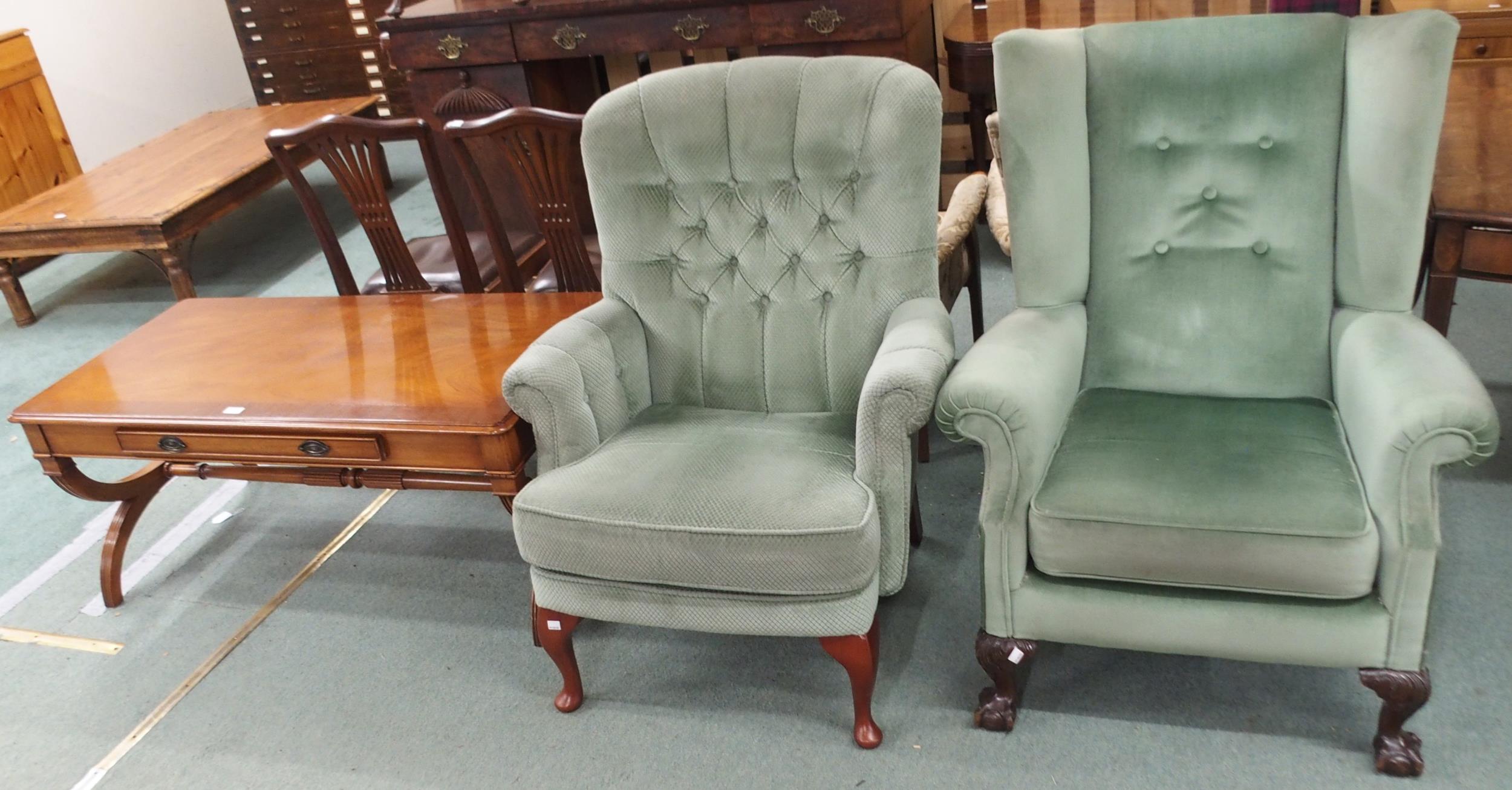 A lot comprising green upholstered wingback armchair, 103cm high x 83cm wide x 91cm deep, another
