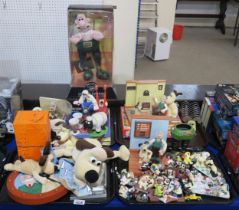 A collection of Wallace and Gromit collectors items including figures, a clock, toastrack etc