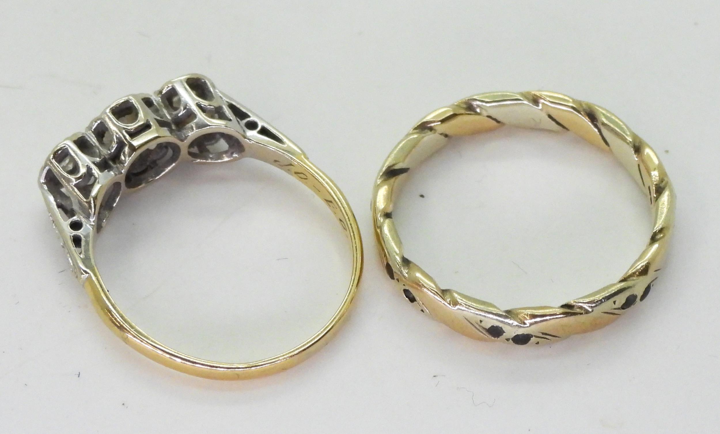 An 18ct gold ring set with three illusion set diamonds, with an approximate total of 0.30cts, finger - Image 2 of 2