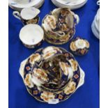 A Royal Albert Heirloom pattern teaset comprising six trios, milk jug, sugar bowl and teapot lid
